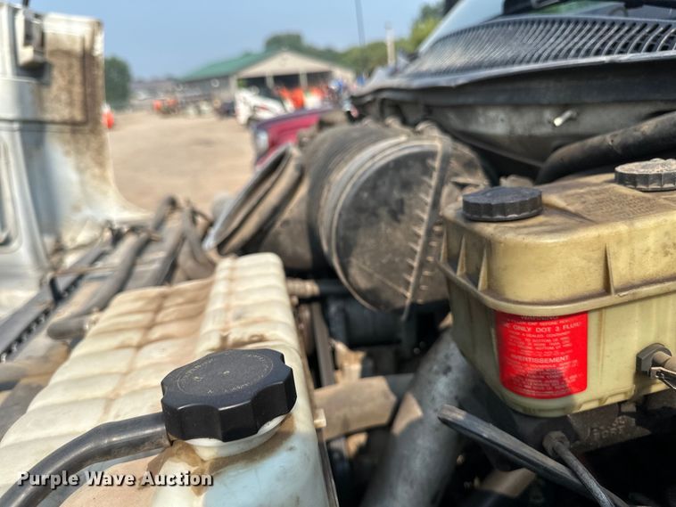 image for item EB2810 2004 GMC C4500 Crew Cab flatbed truck