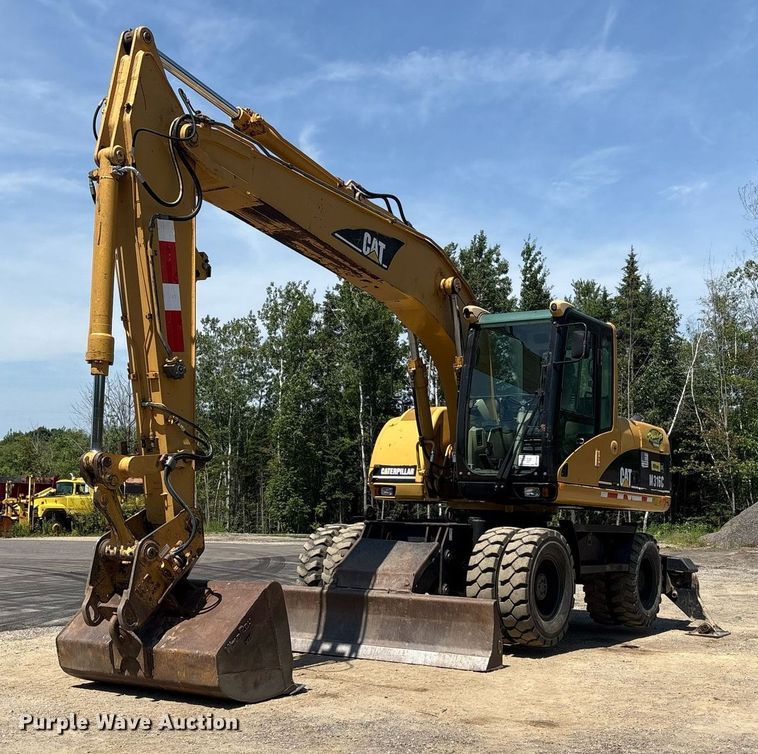image for item EC4360 2004 Caterpillar M316C wheeled excavator