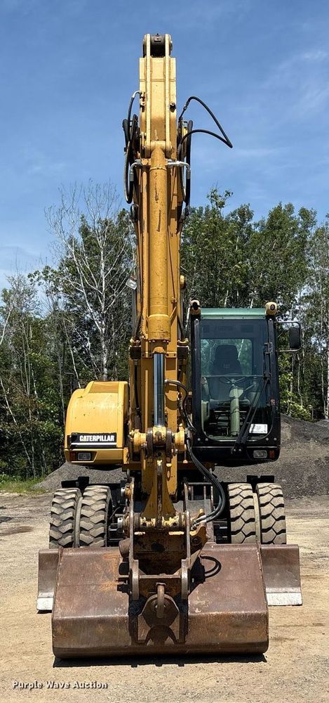 image for item EC4360 2004 Caterpillar M316C wheeled excavator