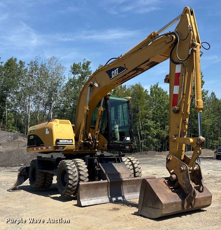 image for item EC4360 2004 Caterpillar M316C wheeled excavator