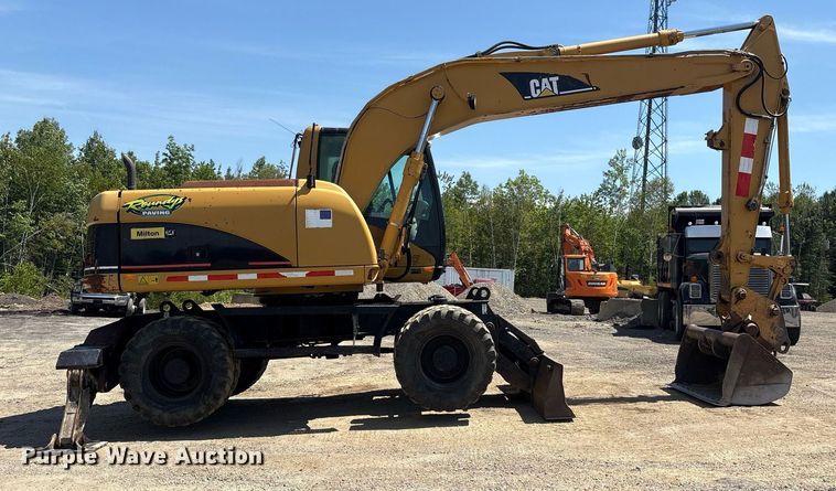 image for item EC4360 2004 Caterpillar M316C wheeled excavator