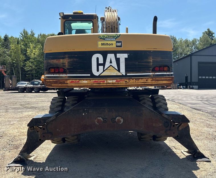 image for item EC4360 2004 Caterpillar M316C wheeled excavator