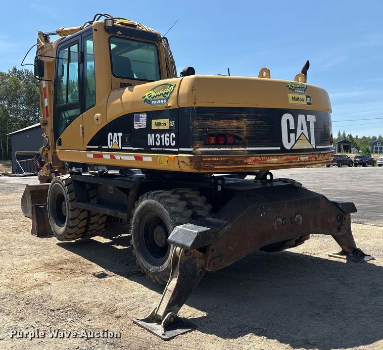 image for item EC4360 2004 Caterpillar M316C wheeled excavator