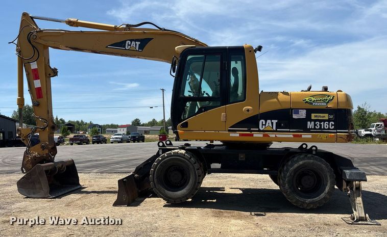 image for item EC4360 2004 Caterpillar M316C wheeled excavator