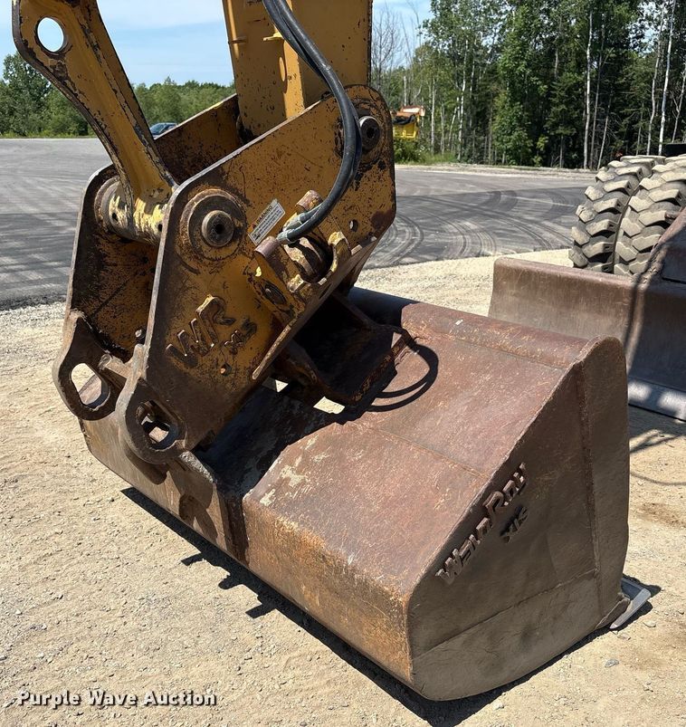 image for item EC4360 2004 Caterpillar M316C wheeled excavator