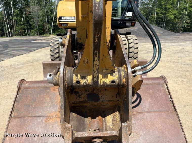 image for item EC4360 2004 Caterpillar M316C wheeled excavator