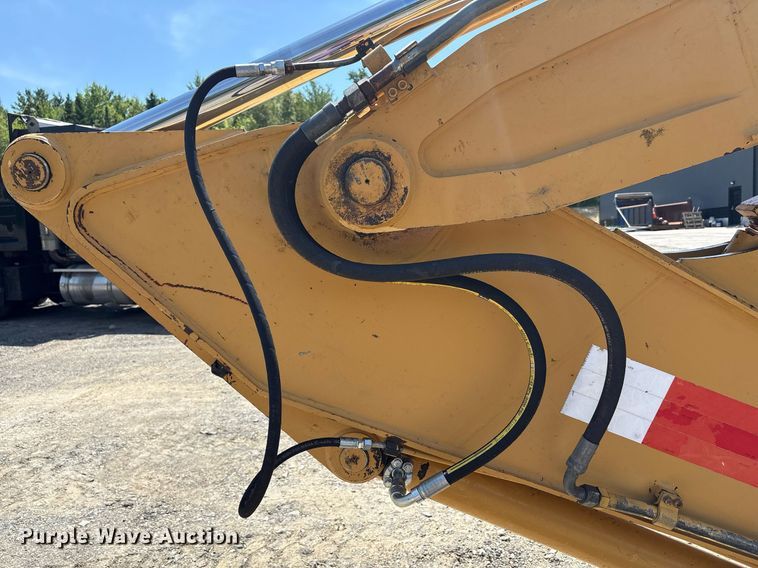 image for item EC4360 2004 Caterpillar M316C wheeled excavator