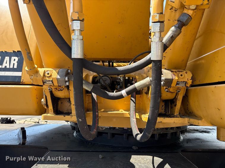 image for item EC4360 2004 Caterpillar M316C wheeled excavator