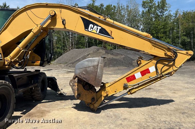 image for item EC4360 2004 Caterpillar M316C wheeled excavator