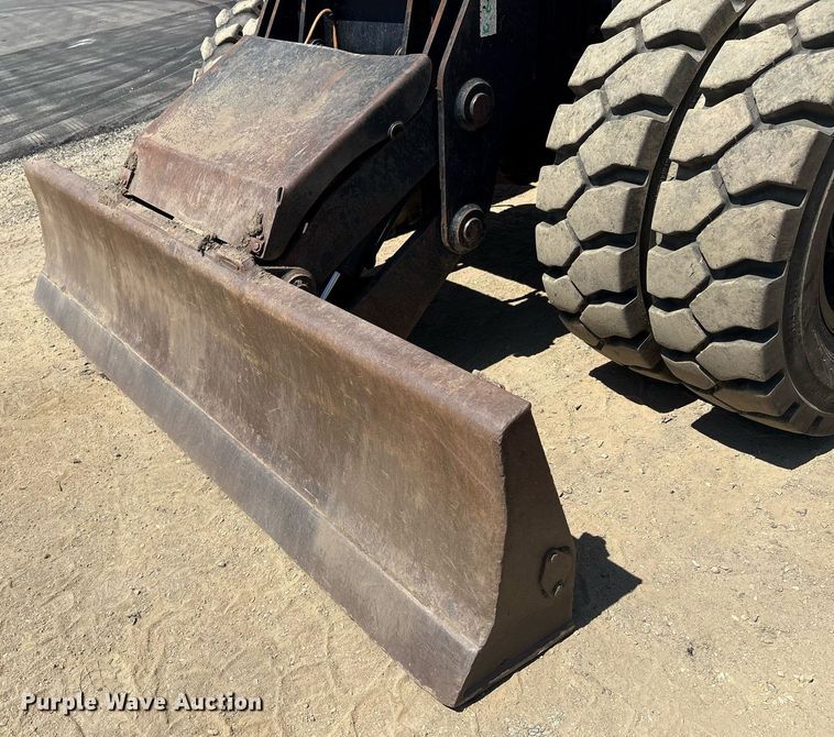 image for item EC4360 2004 Caterpillar M316C wheeled excavator