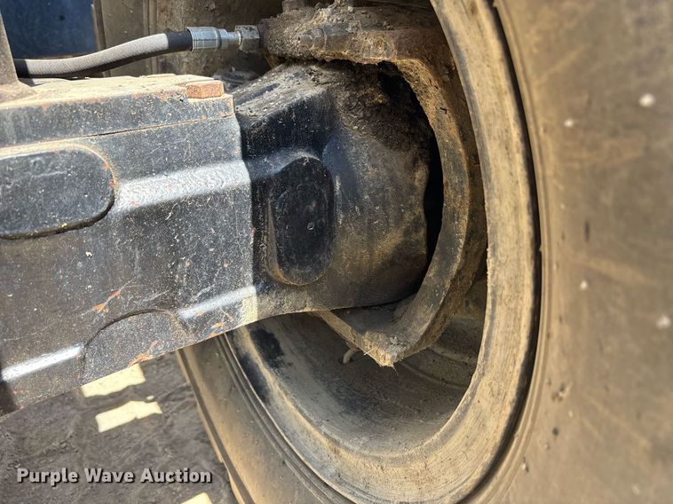 image for item EC4360 2004 Caterpillar M316C wheeled excavator