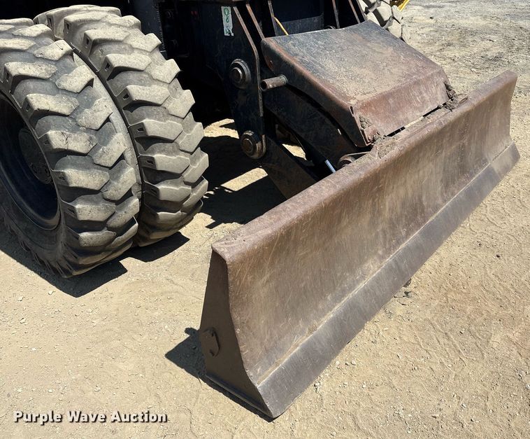 image for item EC4360 2004 Caterpillar M316C wheeled excavator