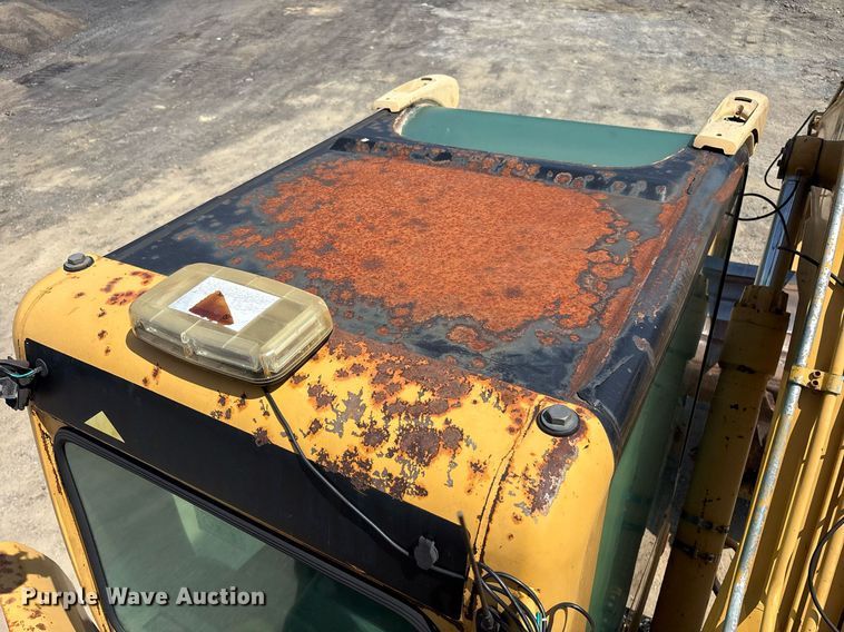 image for item EC4360 2004 Caterpillar M316C wheeled excavator