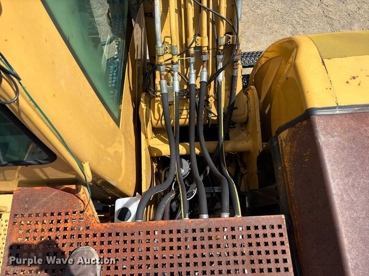 image for item EC4360 2004 Caterpillar M316C wheeled excavator