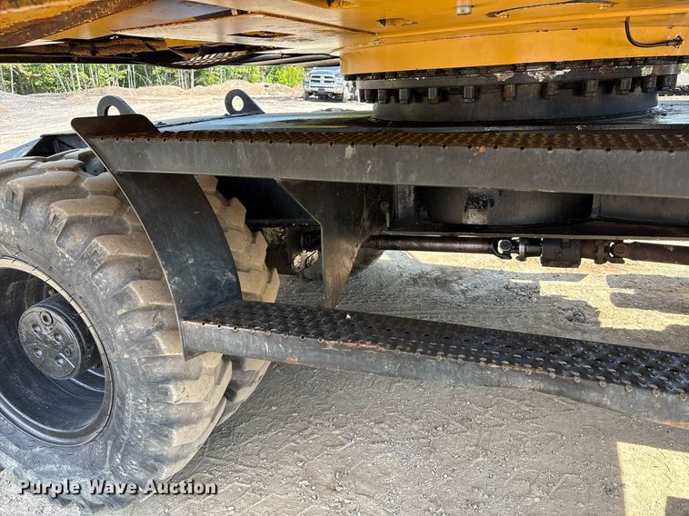 image for item EC4360 2004 Caterpillar M316C wheeled excavator