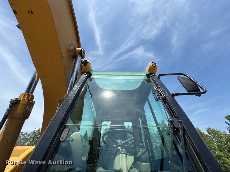 image for item EC4360 2004 Caterpillar M316C wheeled excavator