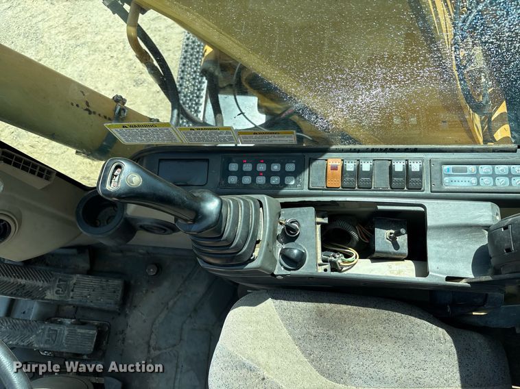 image for item EC4360 2004 Caterpillar M316C wheeled excavator