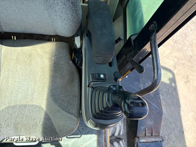 image for item EC4360 2004 Caterpillar M316C wheeled excavator