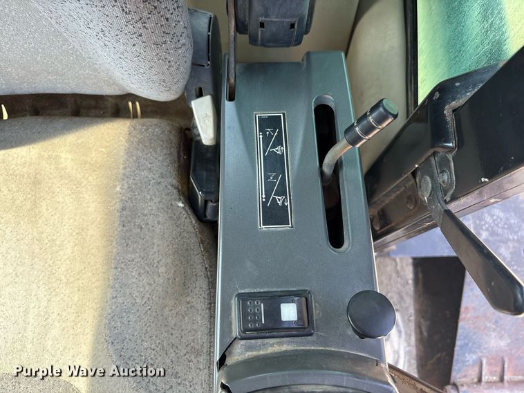 image for item EC4360 2004 Caterpillar M316C wheeled excavator