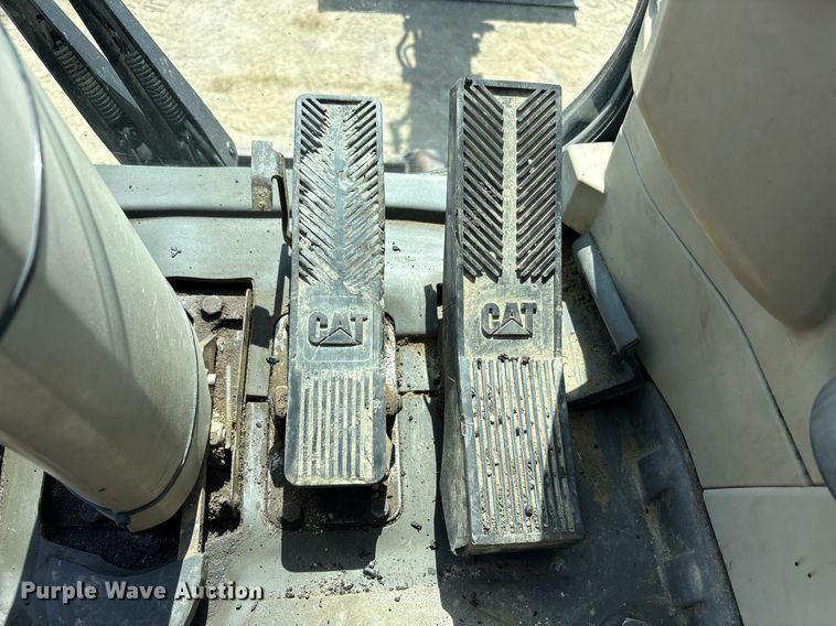 image for item EC4360 2004 Caterpillar M316C wheeled excavator