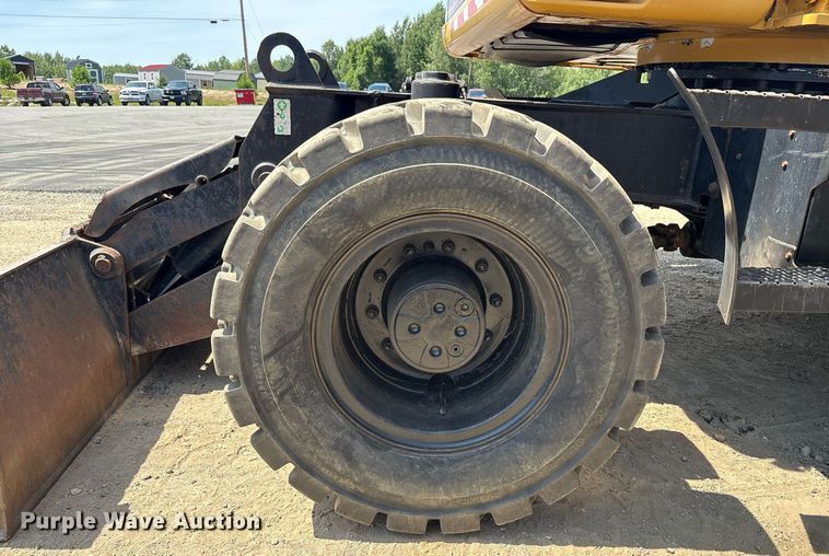 image for item EC4360 2004 Caterpillar M316C wheeled excavator