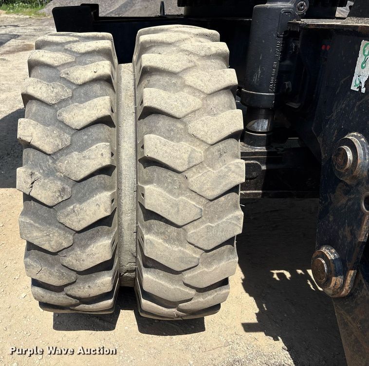 image for item EC4360 2004 Caterpillar M316C wheeled excavator