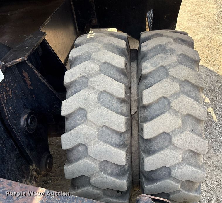 image for item EC4360 2004 Caterpillar M316C wheeled excavator