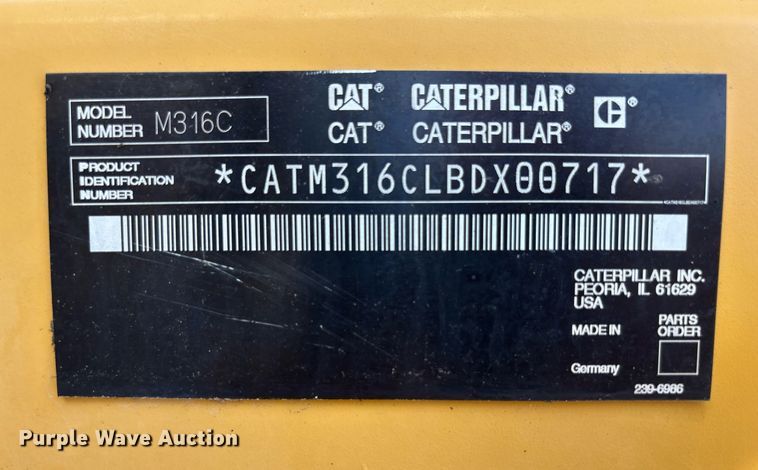 image for item EC4360 2004 Caterpillar M316C wheeled excavator