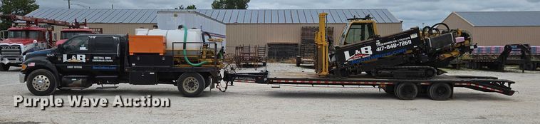 image for item ED2171 2016 Vermeer D24X40III directional boring unit with 2015 Ford F650 flatbed truck and 2021 Norstar equipment trailer