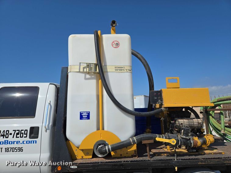 image for item ED2173 2007 Ford F650 XLT Super Duty Crew Cab flatbed truck with mud mixing system