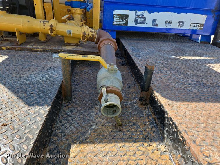 image for item ED2173 2007 Ford F650 XLT Super Duty Crew Cab flatbed truck with mud mixing system