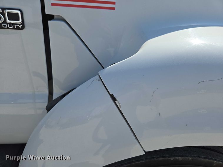 image for item ED2173 2007 Ford F650 XLT Super Duty Crew Cab flatbed truck with mud mixing system