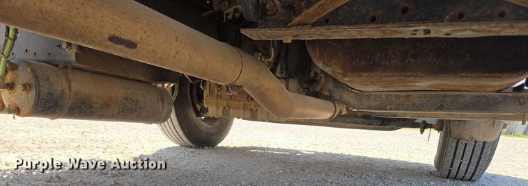 image for item ED2173 2007 Ford F650 XLT Super Duty Crew Cab flatbed truck with mud mixing system