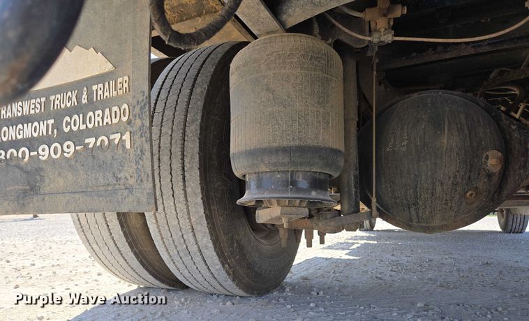 image for item ED2173 2007 Ford F650 XLT Super Duty Crew Cab flatbed truck with mud mixing system