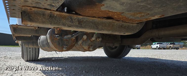 image for item ED2173 2007 Ford F650 XLT Super Duty Crew Cab flatbed truck with mud mixing system