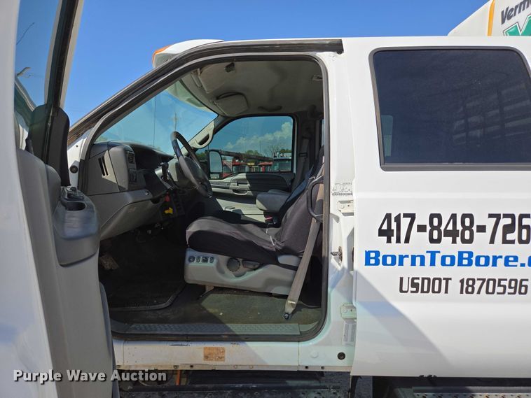 image for item ED2173 2007 Ford F650 XLT Super Duty Crew Cab flatbed truck with mud mixing system