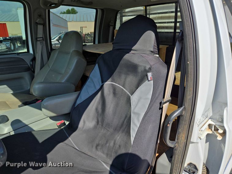 image for item ED2173 2007 Ford F650 XLT Super Duty Crew Cab flatbed truck with mud mixing system