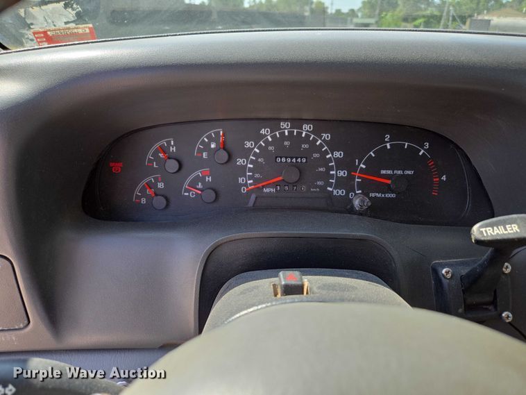 image for item ED2173 2007 Ford F650 XLT Super Duty Crew Cab flatbed truck with mud mixing system