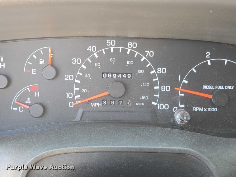 image for item ED2173 2007 Ford F650 XLT Super Duty Crew Cab flatbed truck with mud mixing system