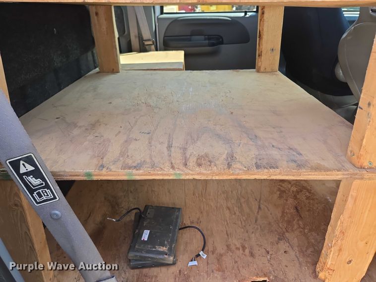 image for item ED2173 2007 Ford F650 XLT Super Duty Crew Cab flatbed truck with mud mixing system