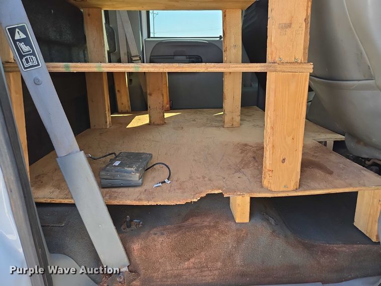 image for item ED2173 2007 Ford F650 XLT Super Duty Crew Cab flatbed truck with mud mixing system