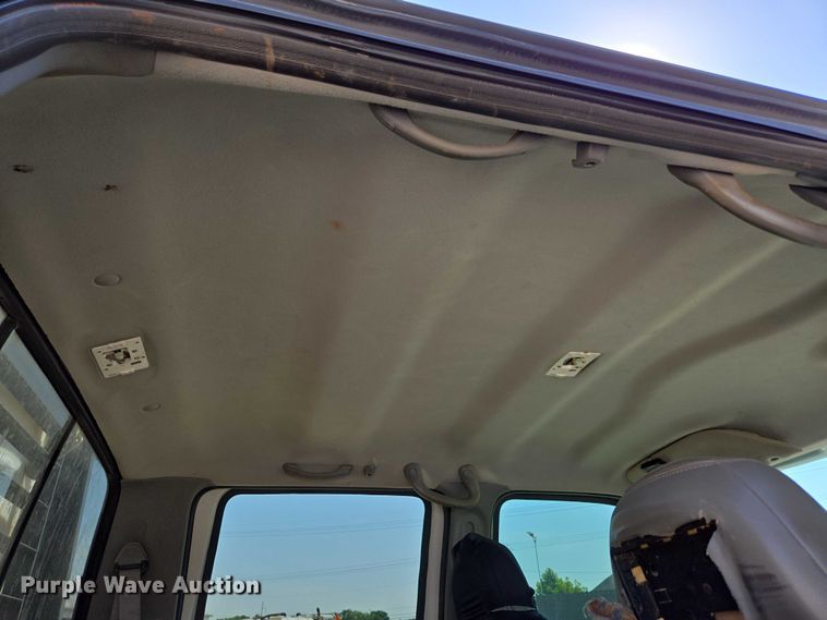 image for item ED2173 2007 Ford F650 XLT Super Duty Crew Cab flatbed truck with mud mixing system