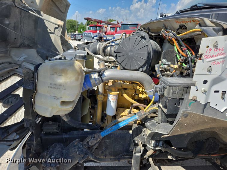 image for item ED2173 2007 Ford F650 XLT Super Duty Crew Cab flatbed truck with mud mixing system