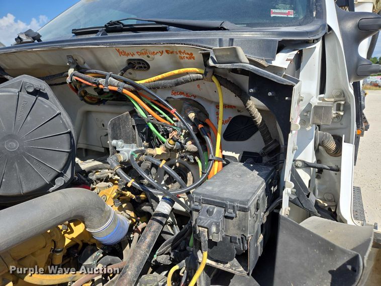 image for item ED2173 2007 Ford F650 XLT Super Duty Crew Cab flatbed truck with mud mixing system