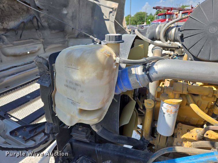 image for item ED2173 2007 Ford F650 XLT Super Duty Crew Cab flatbed truck with mud mixing system