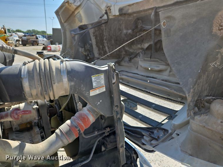 image for item ED2173 2007 Ford F650 XLT Super Duty Crew Cab flatbed truck with mud mixing system