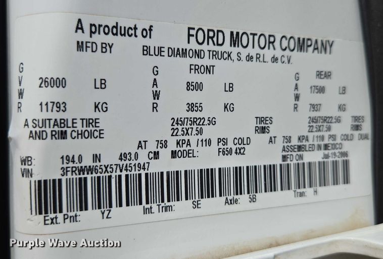 image for item ED2173 2007 Ford F650 XLT Super Duty Crew Cab flatbed truck with mud mixing system