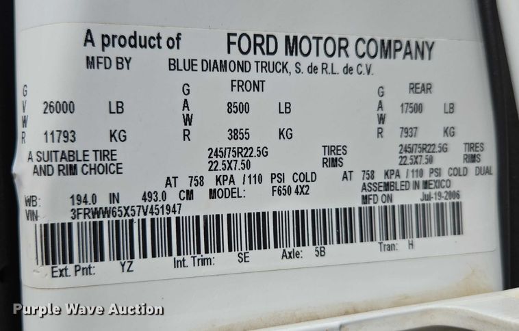 image for item ED2173 2007 Ford F650 XLT Super Duty Crew Cab flatbed truck with mud mixing system