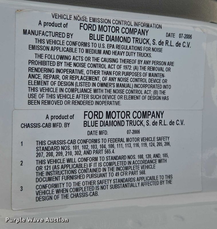 image for item ED2173 2007 Ford F650 XLT Super Duty Crew Cab flatbed truck with mud mixing system