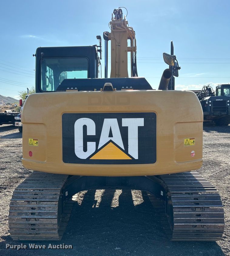 image for item EL6086 2018 Caterpillar 311FL RR  excavator